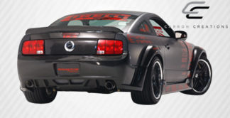 2005-2009 Ford Mustang Carbon Creations Circuit Wide Body Rear Bumper Cover – 1 Piece (Overstock)
